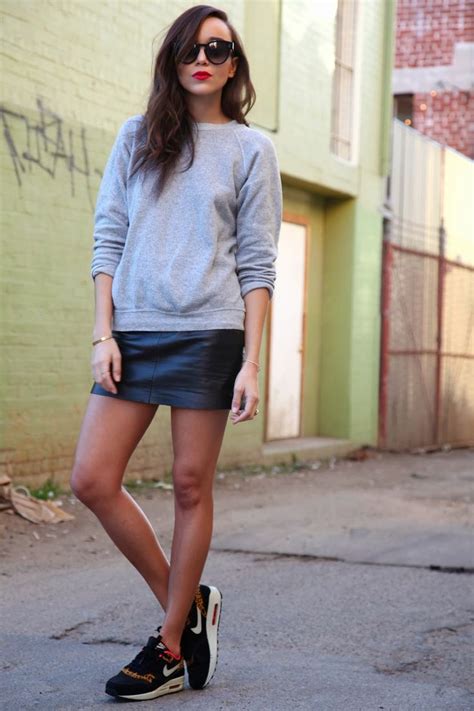 leather skirt and sneakers